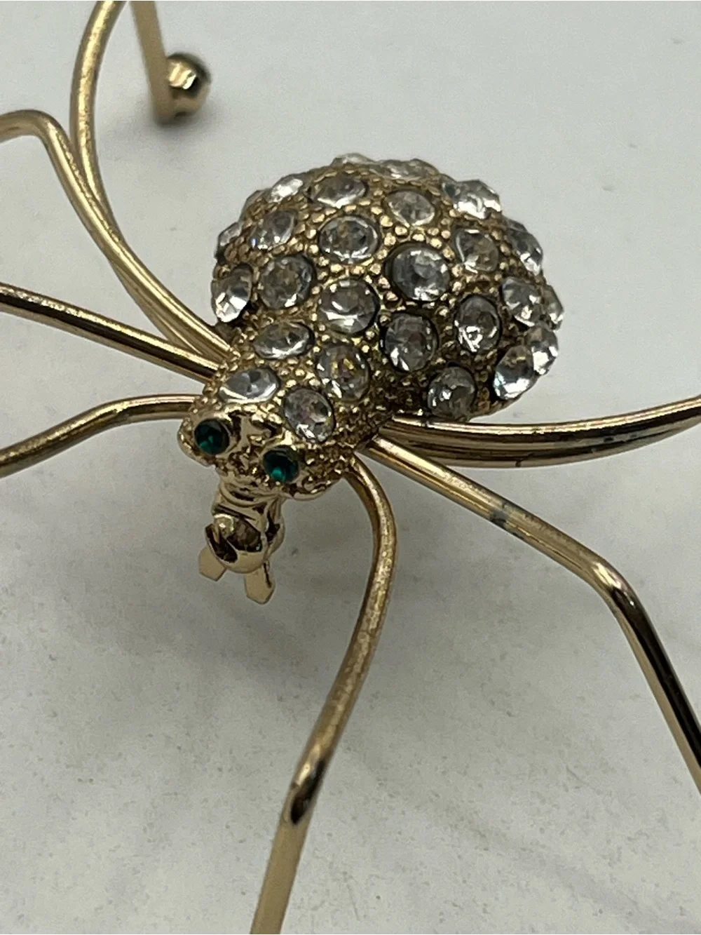 Spider insect gold tone clear rhinestone brooch pin